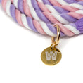 Load image into Gallery viewer, Pink, purple and white rope leash with gold charm featuring The Woofdrobe logo on a white background.